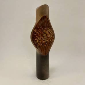 A Ceramic Vase with Wood Inlay